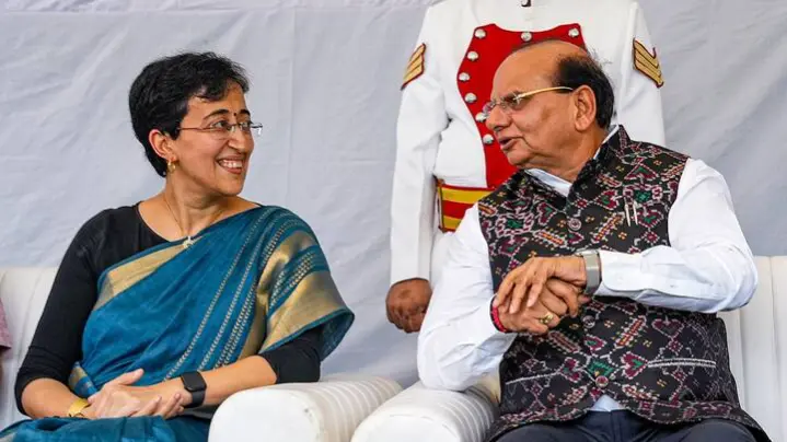 Delhi LG VK Saxena Vs CM Atishi