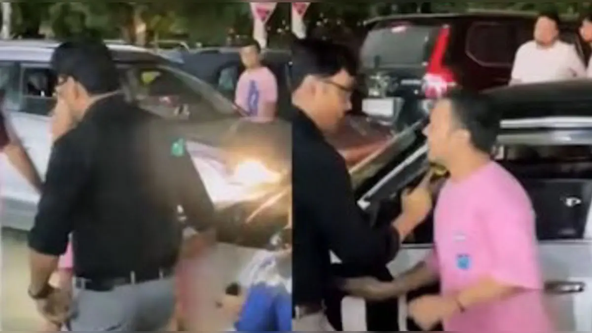 Delhi Roadside Clash Turns Dramatic: Woman Hurls Abuse, Men Hit Each Other, People React As 'Ye Big Boss Material Hai!' Delhi Roadside Clash Turns Dramatic: Woman Hurls Abuse as Men Exchange Blows—'Bigg Boss Material!'