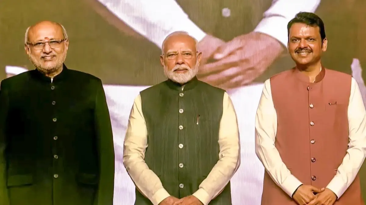 The Return Of Fadnavis: A Success Story Of Patience, Loyalty To Party and Strategic Acumen Devendra Fadnavis at swearing-in ceremony with Prime Minister Modi and Maharashtra Governor CP Radhakrishnan