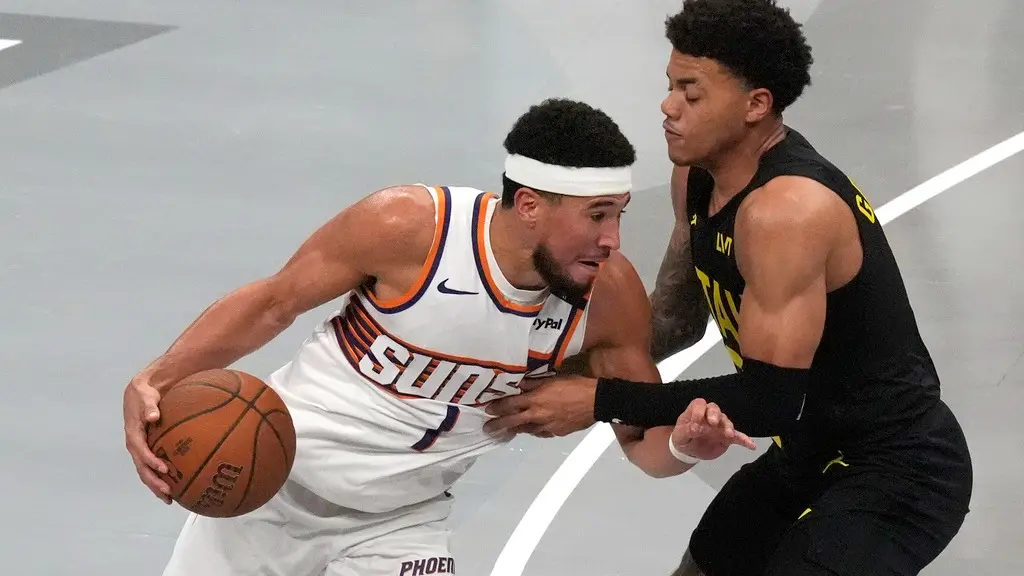 Booker Scores 31, Leads Suns To 120-112 Victory Over Jazz In The Teams' NBA Cup Opener Devin Booker in action for Phoenix Suns vs Utah Jazz