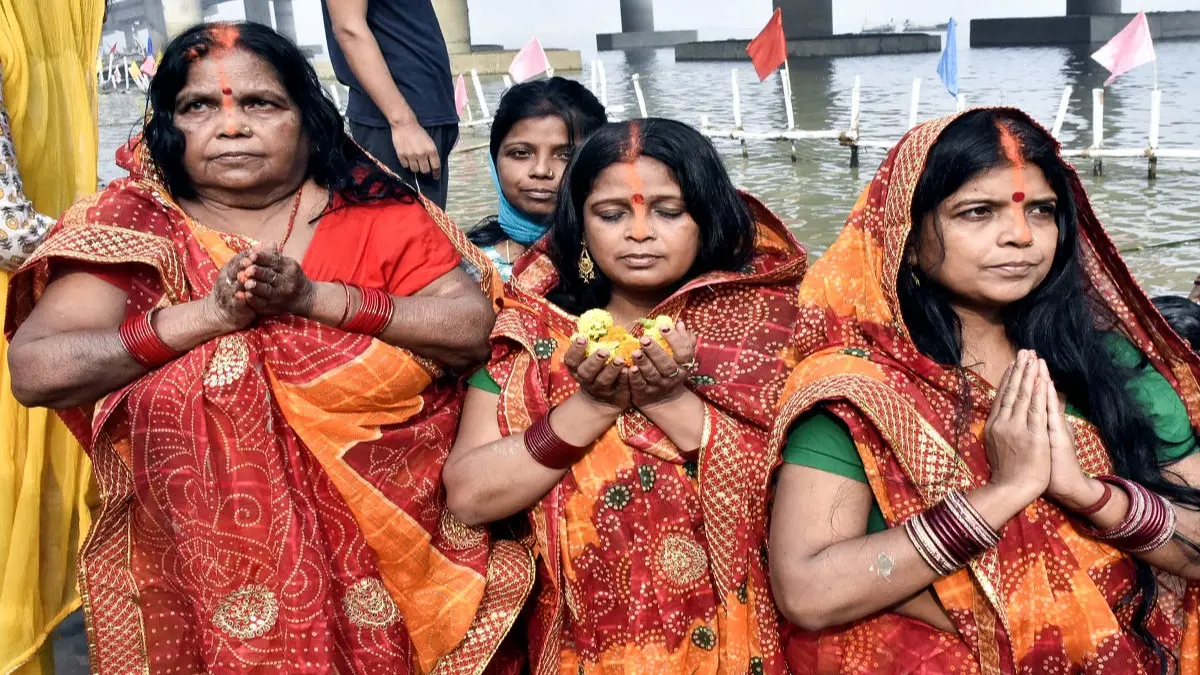 Chhath Puja 2025: Glimpses of 'Nahay Khay' Rituals as PM Modi Extends Greetings to Devotees Across India Devotees perform rituals on the banks of the Ganga River on the occasion of 'Nahay Khay', the first day of Chhath Puja festival, in Patna on Saturday.