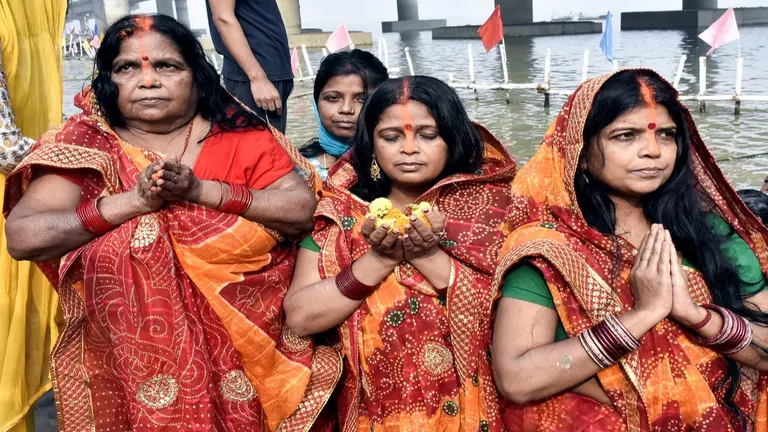 Chhath Puja 2025: Glimpses of 'Nahay Khay' Rituals as PM Modi Extends Greetings to Devotees Across India Devotees perform rituals on the banks of the Ganga River on the occasion of 'Nahay Khay', the first day of Chhath Puja festival, in Patna on Saturday.
