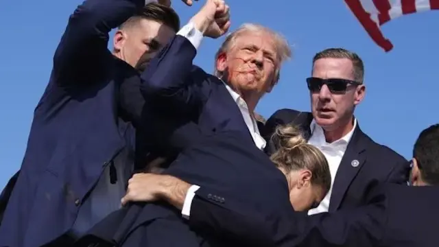 Donald Trump Defiantly Pumps His Fist Moments After Surviving Assassination Bid | VIDEO