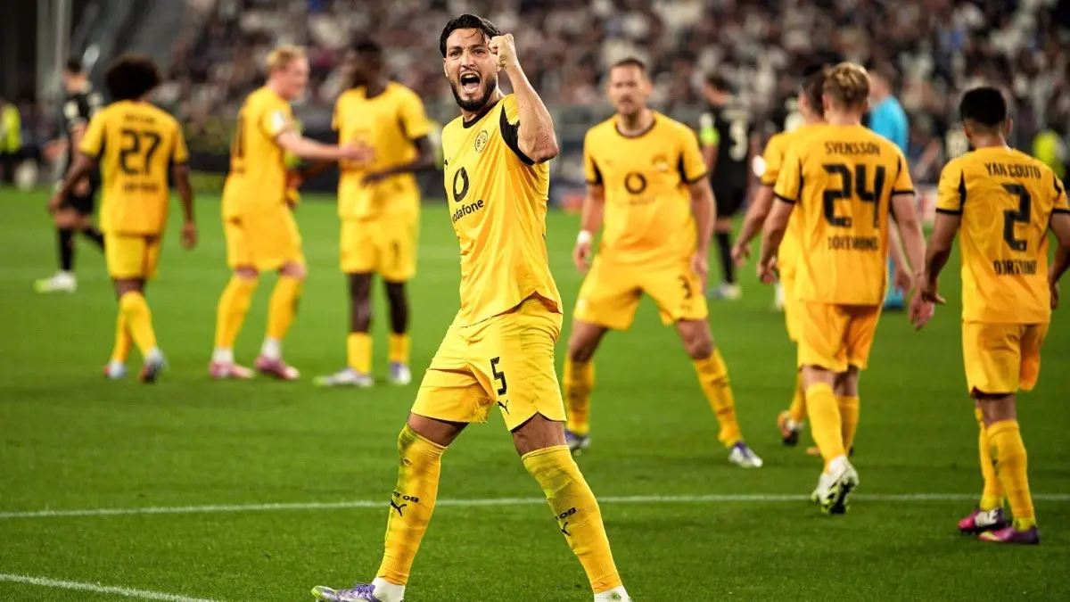 Dortmund's Ramy Bensebain celebrates after scoring against Juventus in UCL