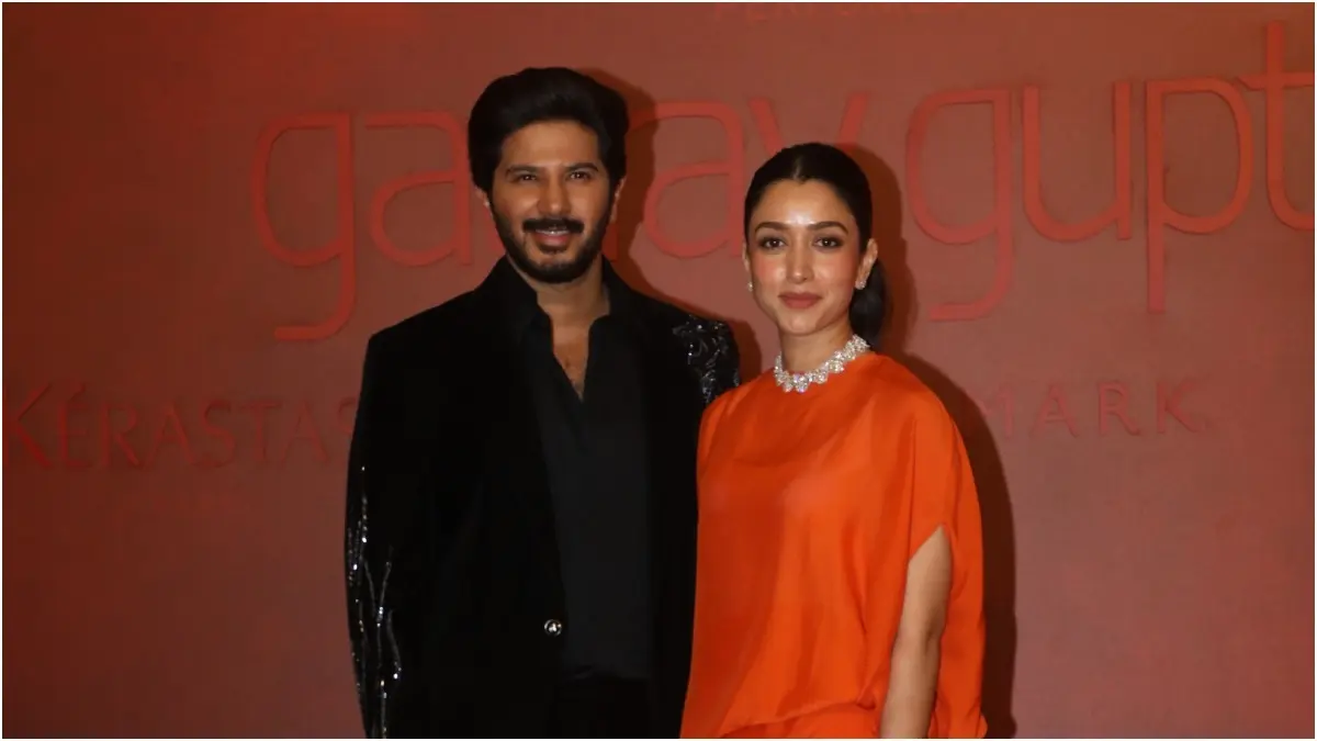 Dulquer Salman's Wife Amal Sufiya Adds Glam To Gaurav Gupta's Bridal Couture Show, Sizzles In Lava Orange | Photos Dulquer Salmaan with Amal Sufiya