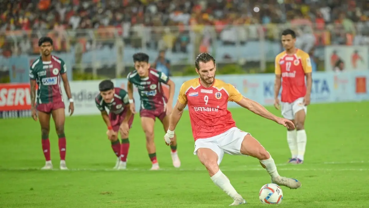 Durand Cup 2025: East Bengal Conquer Kolkata! Red & Golds Seal Commanding 2-1 Victory Over Mohun Bagan SG In A Thrilling Derby East Bengal attacker Dimitrios Diamantakos while taking the penalty kick against Mohun Bagan SG in Kolkata derby