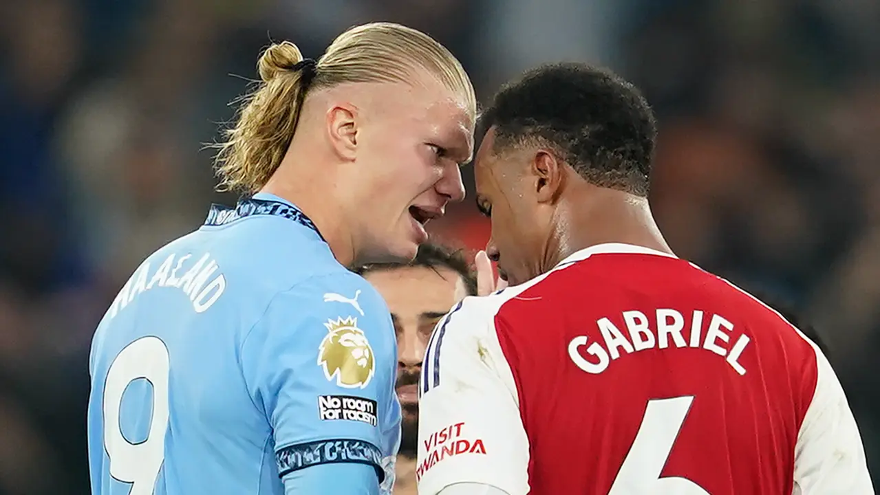 Erling Haaland Gets Off Scot-Free After Hitting The Ball In The Back Of Gabriel Magalhaes' Head Erling Haaland and Gabriel Magalhaes during the Man City vs Arsenal match.