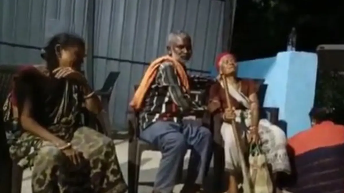 Family members mourn the deaths of their relatives