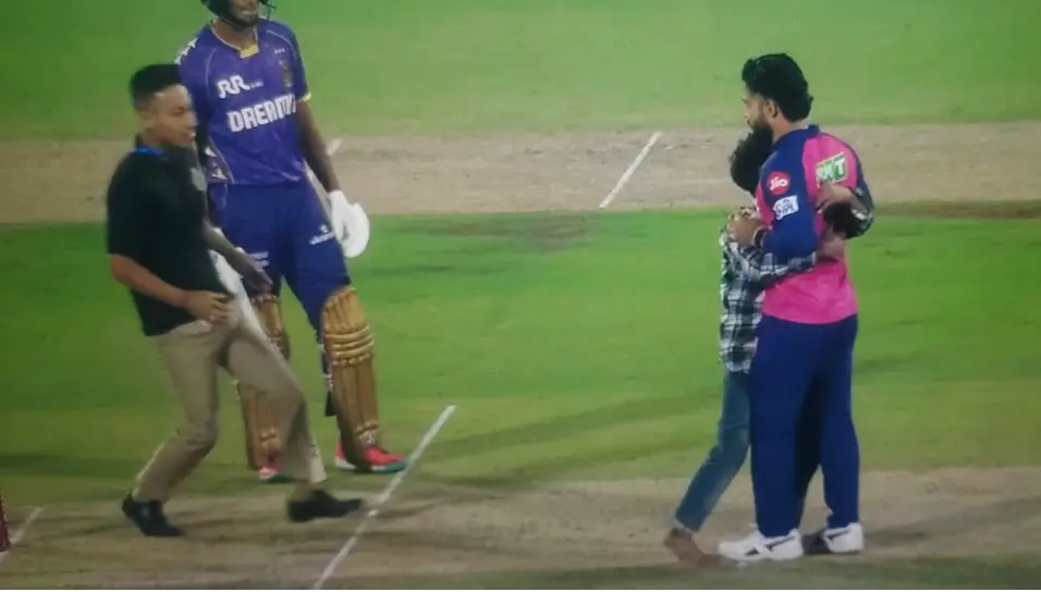 IPL 2025: RR vs KKR Play Briefly Interrupted After Fan Invades Pitch, Hugs Skipper Riyan Parag At Barsapara Stadium Fan Hugs Riyan Parag