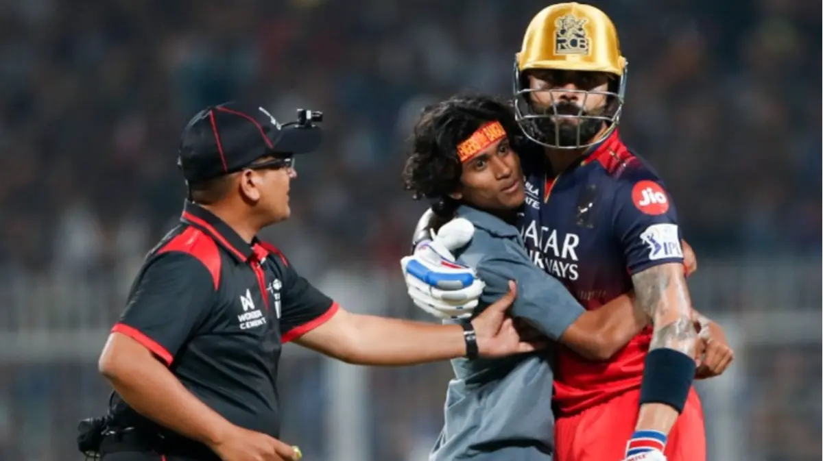 Fan invades pitch to hug Virat Kohli during IPL 2025 opener