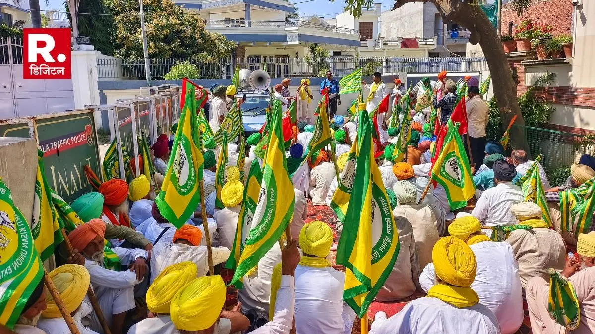 Farmers stage a protest outside Punjab Cabinet Minister Dr. Balbir Singh's residence