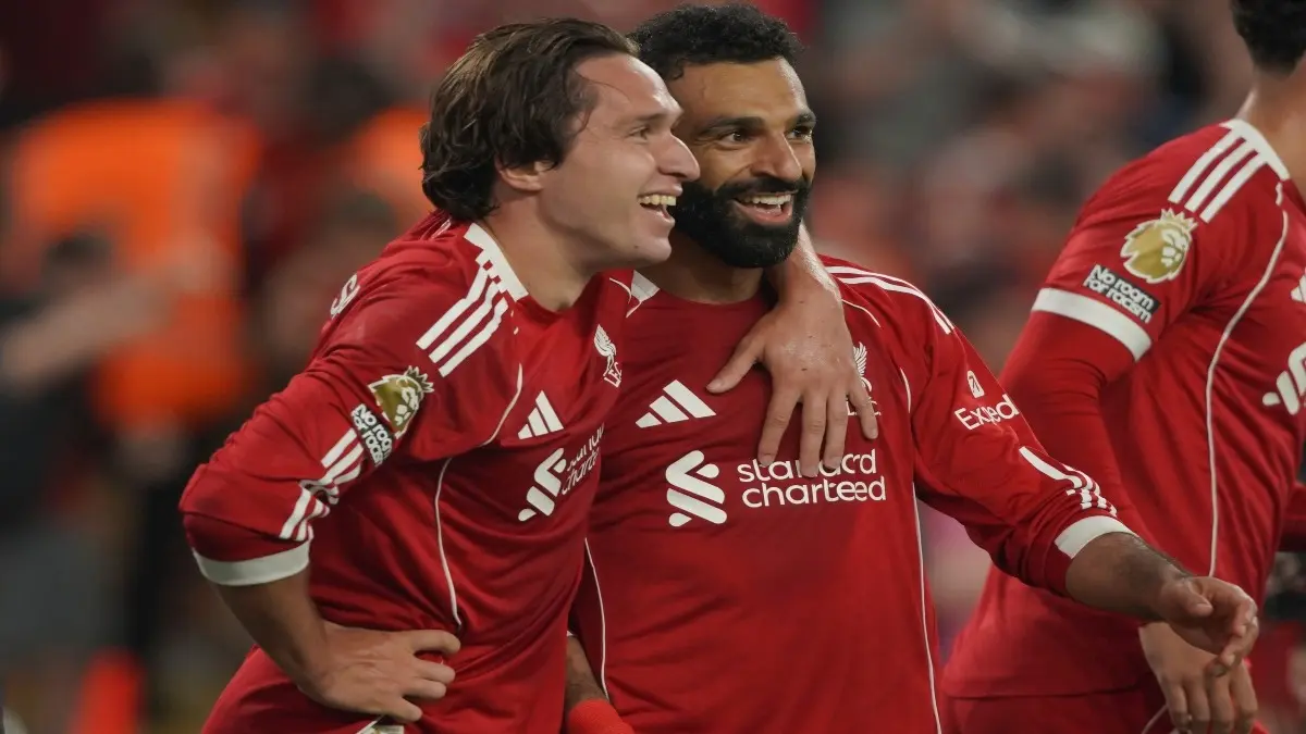Federico Chiesa celebrates a goal with Mohamed Salah