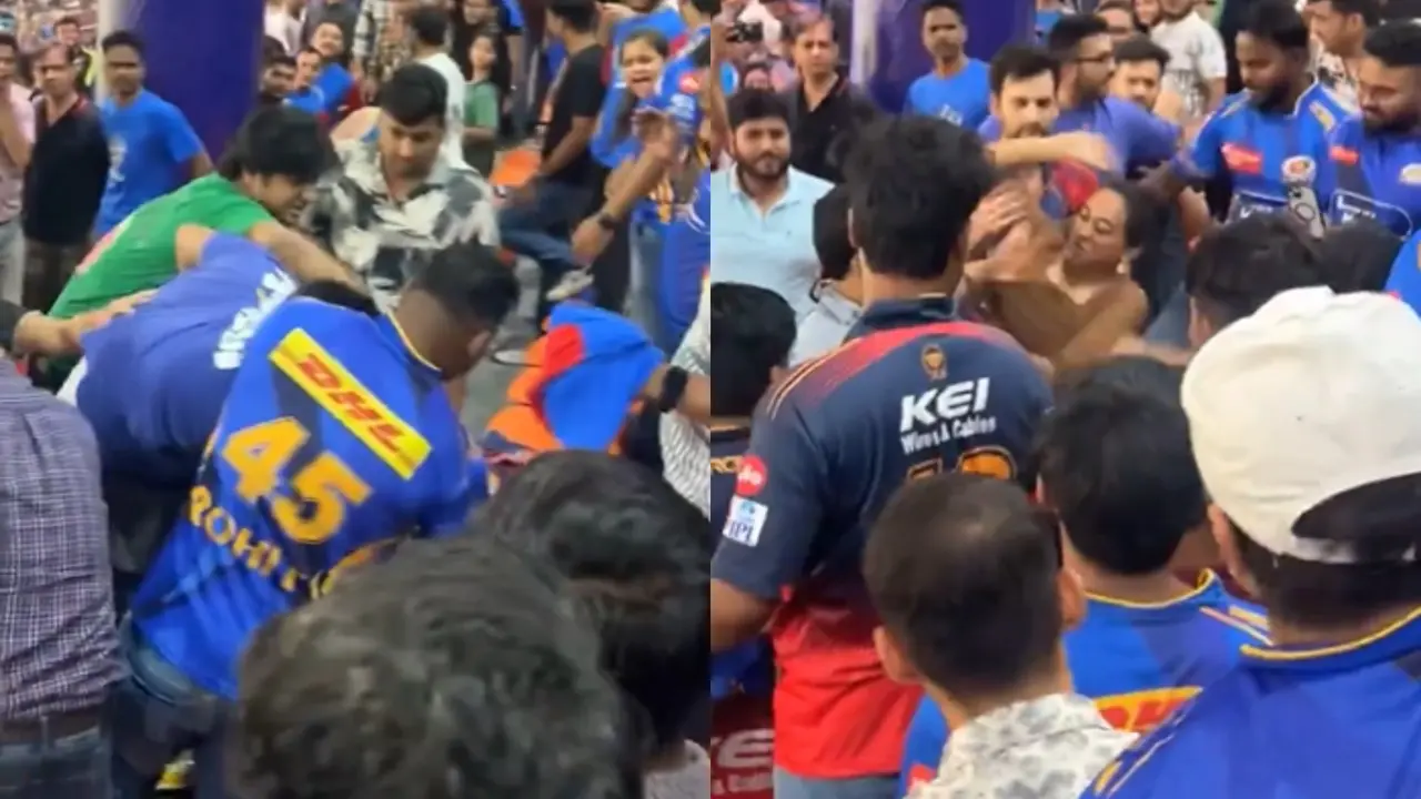 Fight Between Girl and Boy Steals the Spotlight During MI vs DC IPL Match at Arun Jaitley Stadium | WATCH Fight between girl and boy during IPL match, viral video
