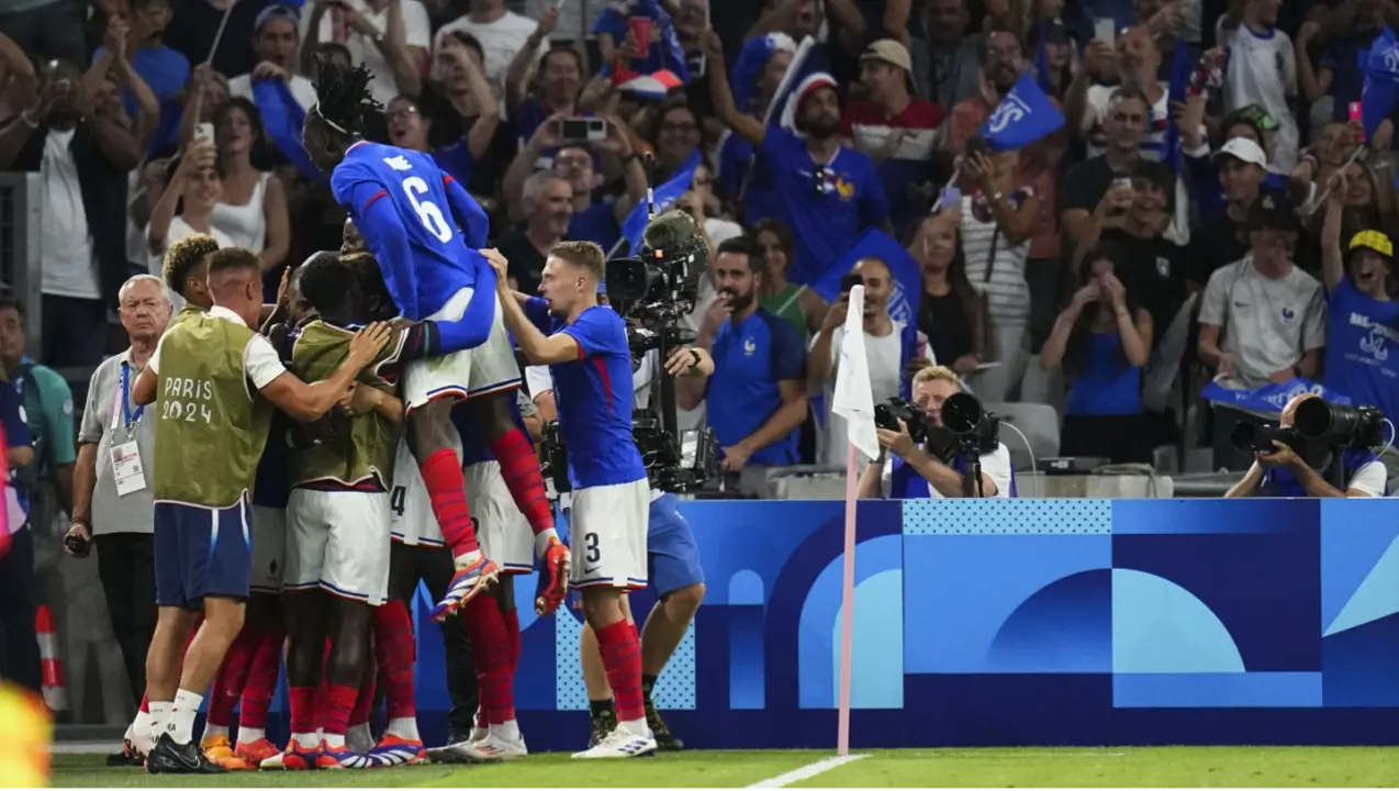 France beats US 3-0 and Morocco gets a win against Argentina in a wild start to Olympic soccer France