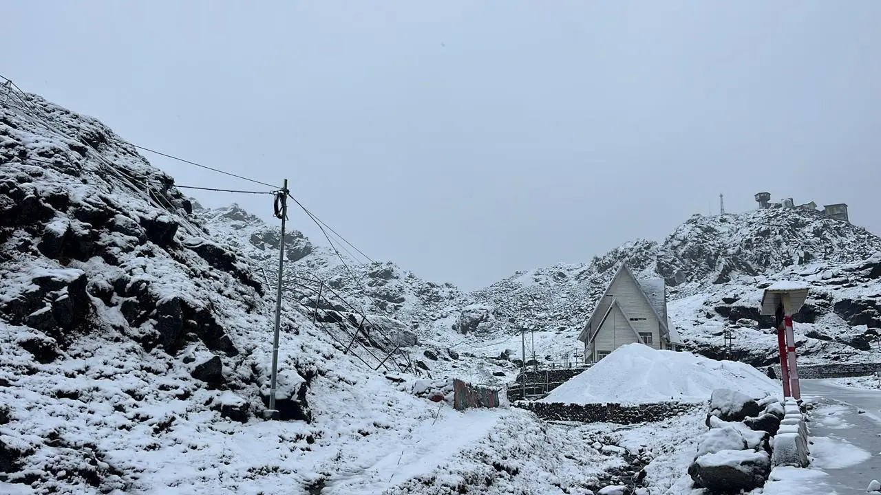 Fresh snowfall blanketed the higher reaches of the India-China border, including the Nathula Pass area, on Friday, bringing temperatures down sharply across Sikkim.