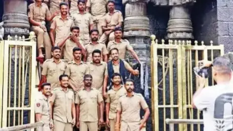 Furore as picture of Kerala Cops standing on Sabarimala sacred steps, inquiry ordered