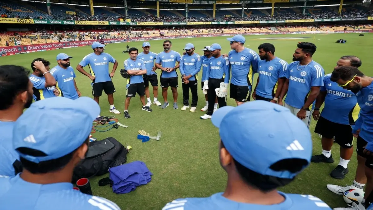 Gautam Gambhir addresses a team hurdle during a practice session