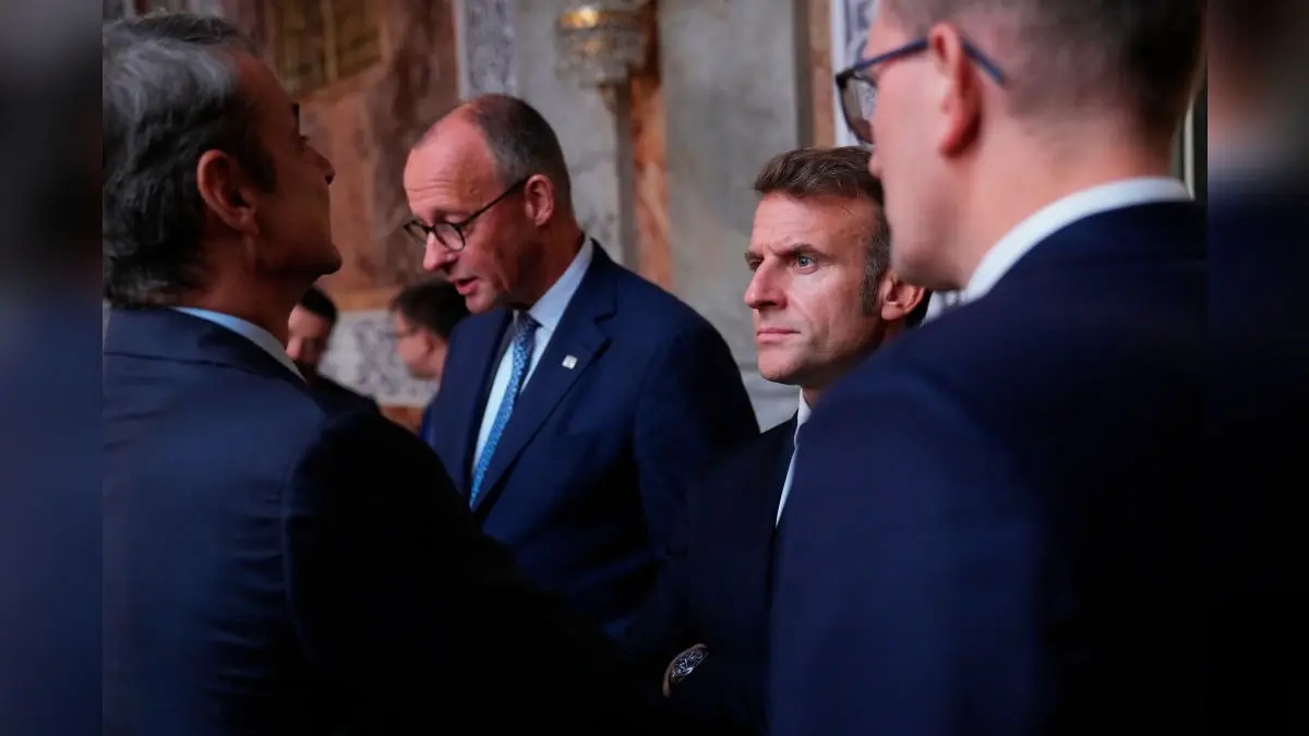 EU Leaders Consider Using Seized Russian Assets To Fund Loan To Ukraine German Chancellor Friedrich Merz and French President Emmanuel Macron prior to an informal summit in the Danish Parliament at Christiansborg Castle in Copenhagen, on Wednesday.