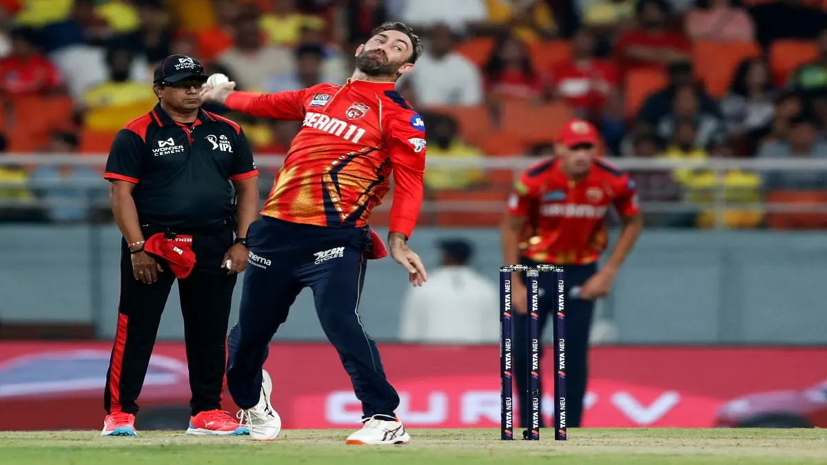 Glenn Maxwell bowls during an IPL match