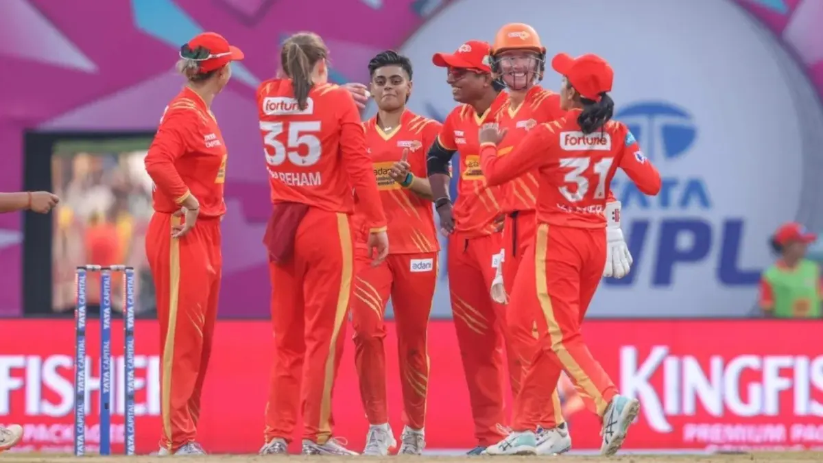 Gujarat Giants players celebrating after taking a wicket against UP Warriorz in WPL 2026