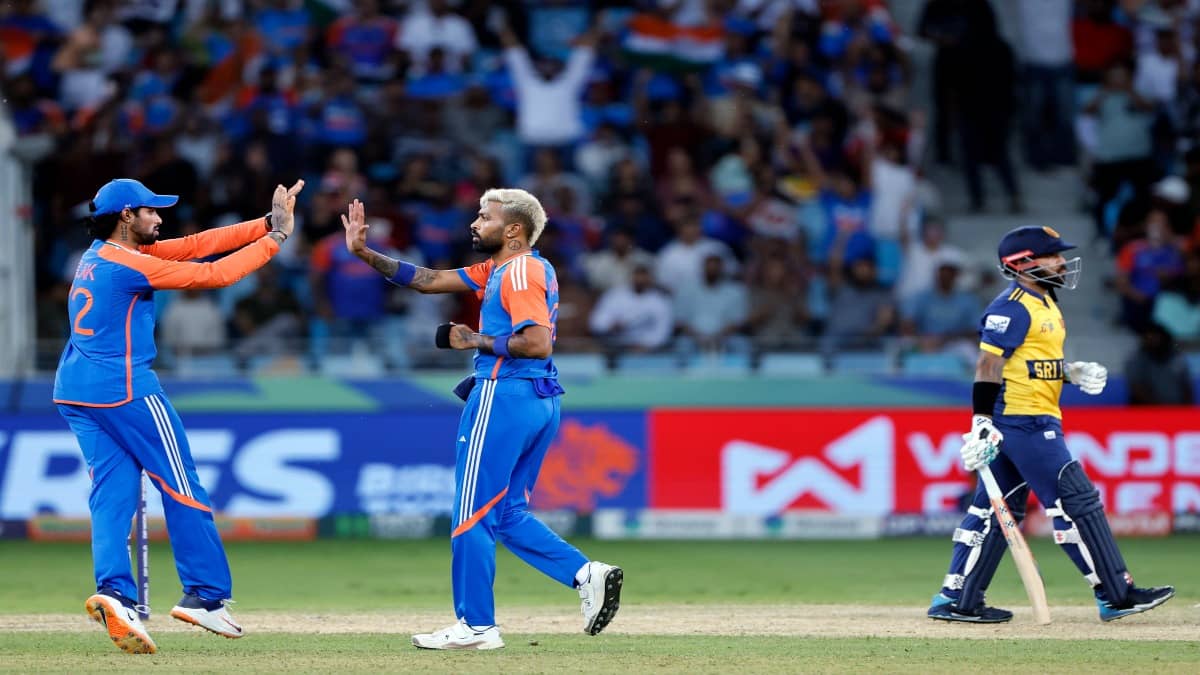 Hardik Pandya and Tilak Varma celebrate a wicket