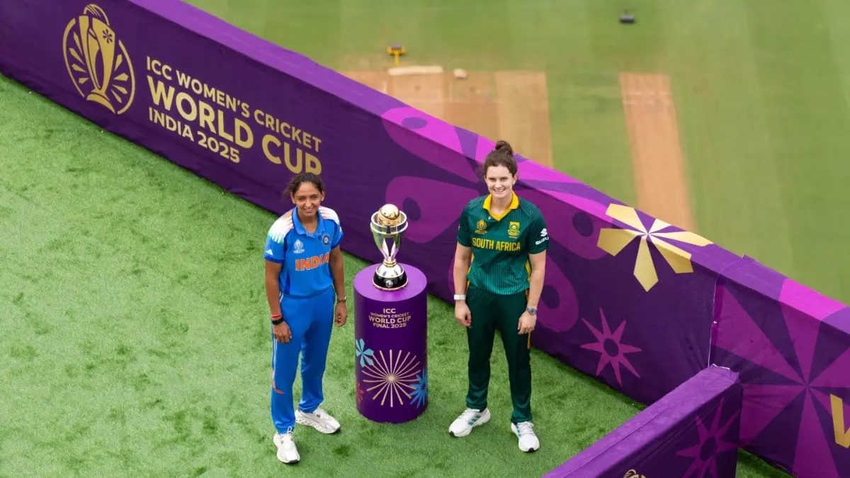 Harmanpreet Kaur and Laura Wolvaardt pose with Women's World Cup 2025 trophy in Navi Mumbai