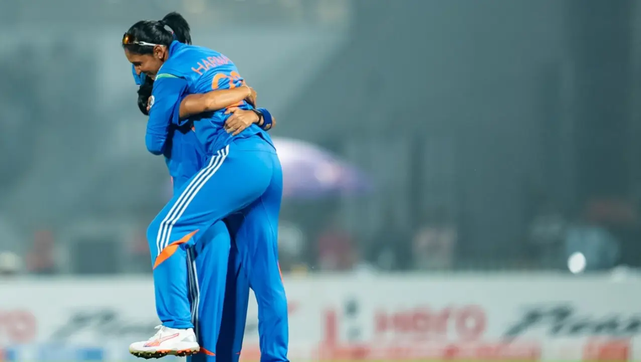 Harmanpreet Kaur celebrates after a wicket