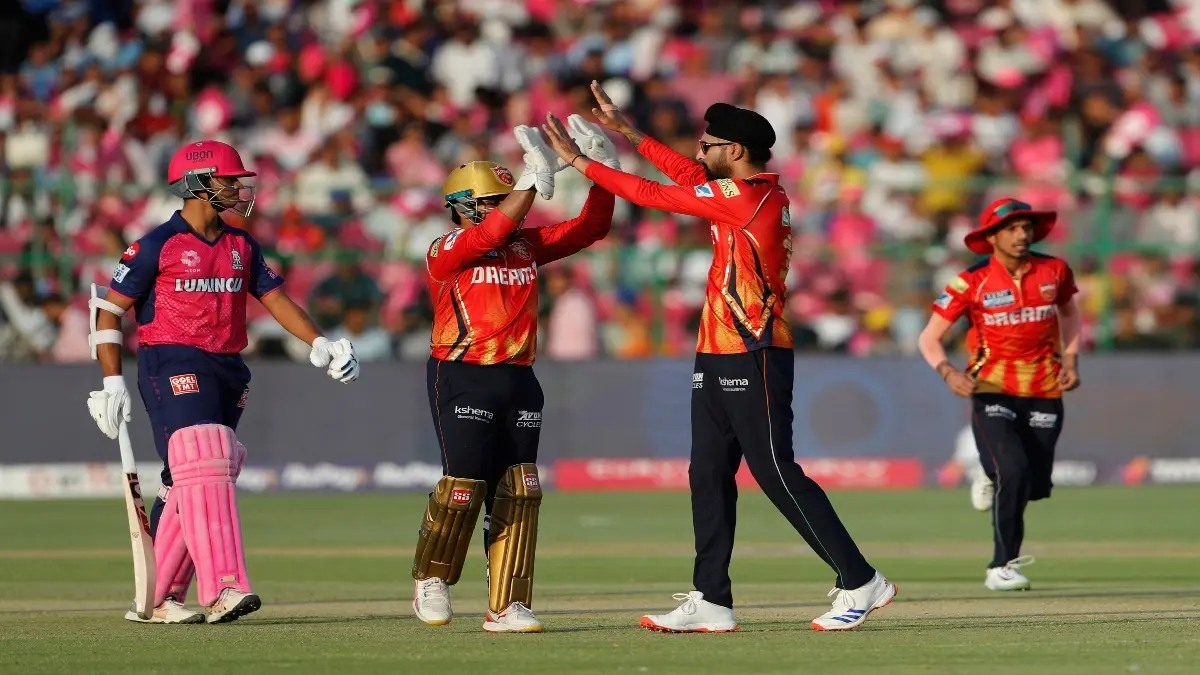 Harpreet Brar celebrates a wicket
