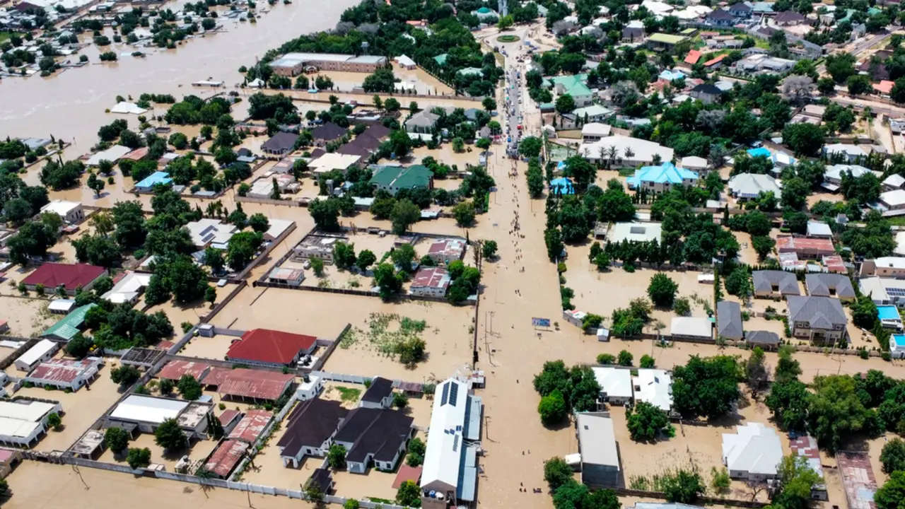 Houses are partially submerged following a dam collapse in Nigeria
