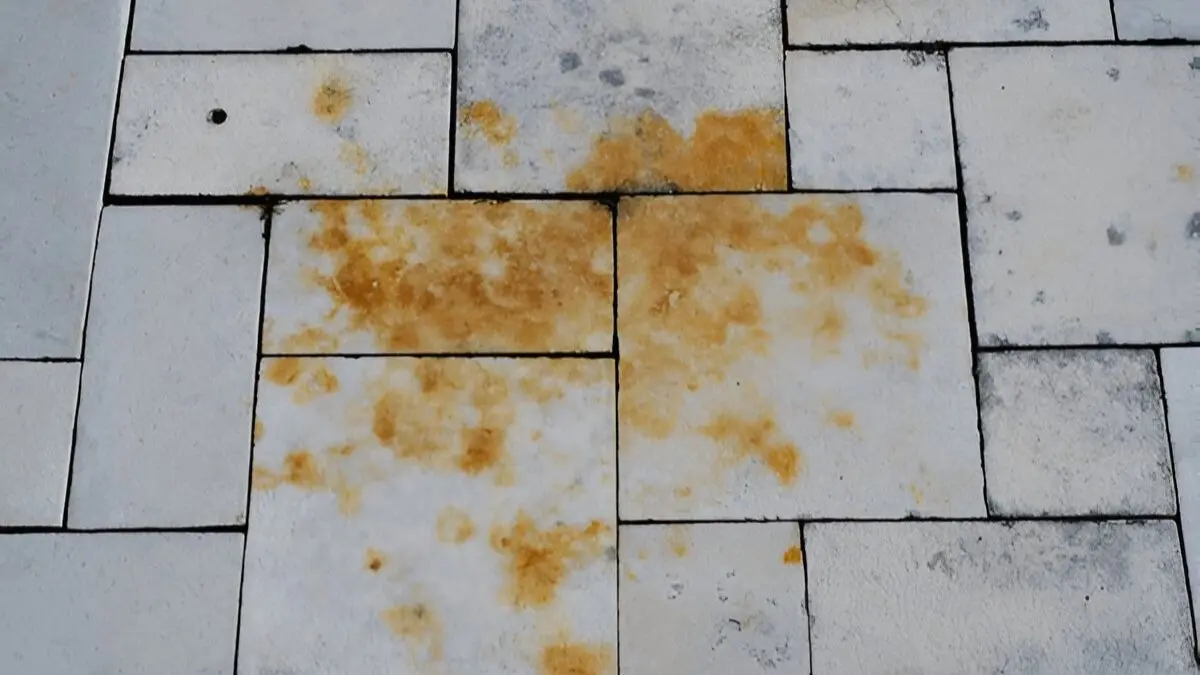 how to remove rust from floor tiles
