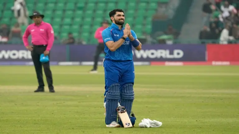 Ibrahim Zadran celebrates after scoring his century