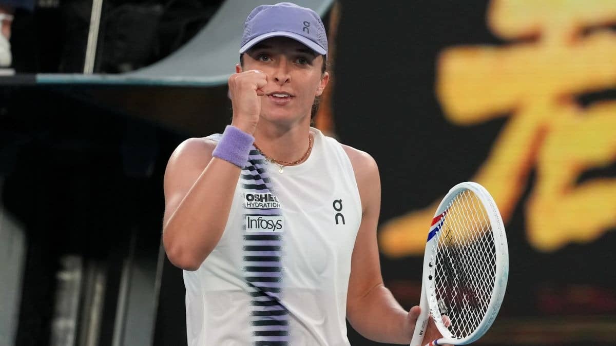 Iga Swiatek of Poland celebrates after defeating Maddison Inglis