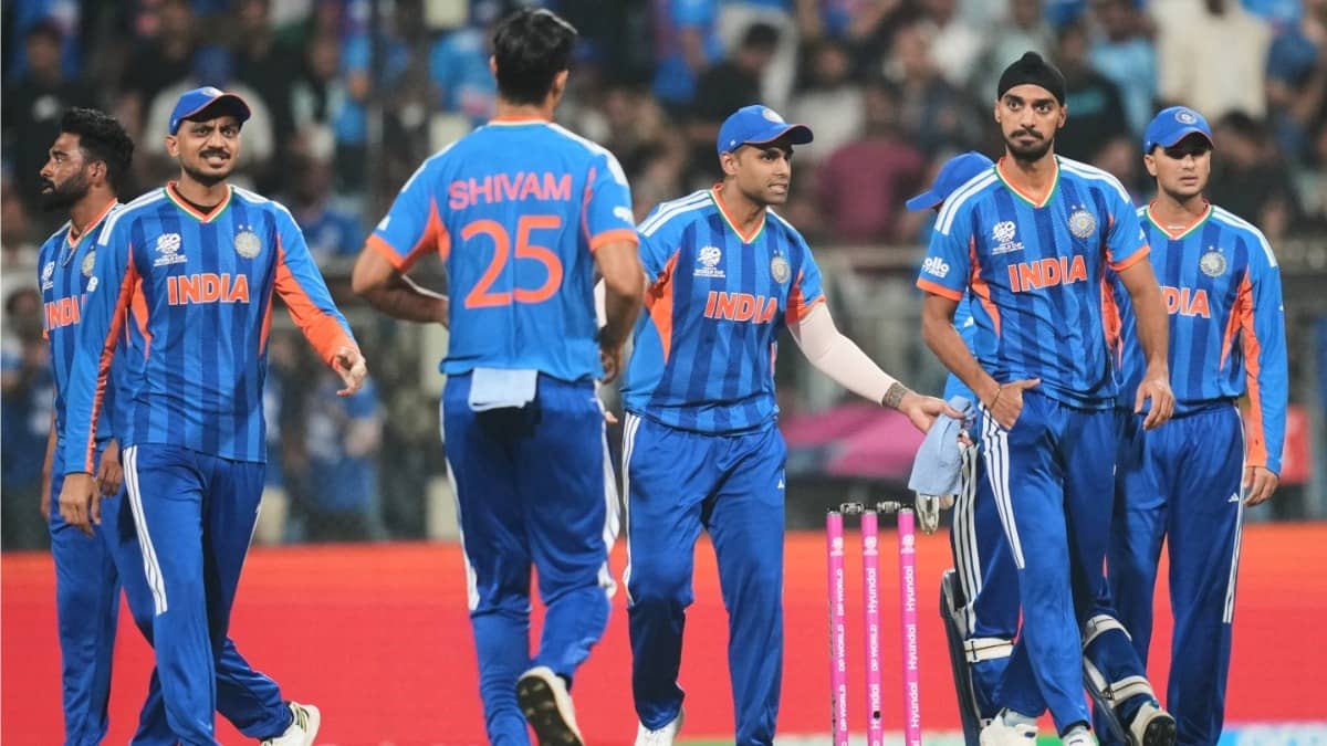 India's Arshdeep Singh celebrates with teammates after the wicket of USA skipper Monank Patel