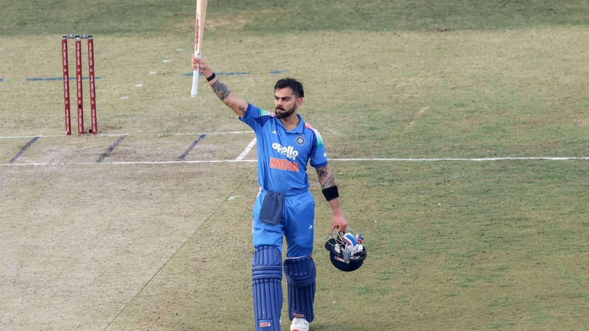 India's Virat Kohli raises his bat as he celebrates his century during the first ODI against South Africa