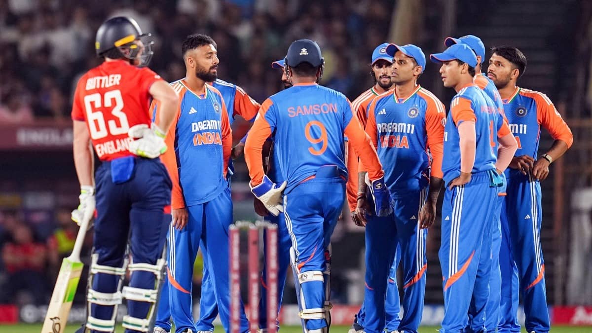 Indian cricketers celebrate a wicket