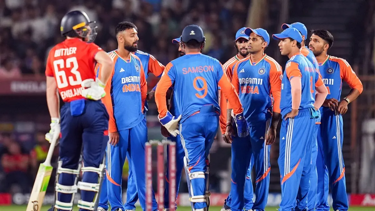 Indian cricketers celebrate a wicket