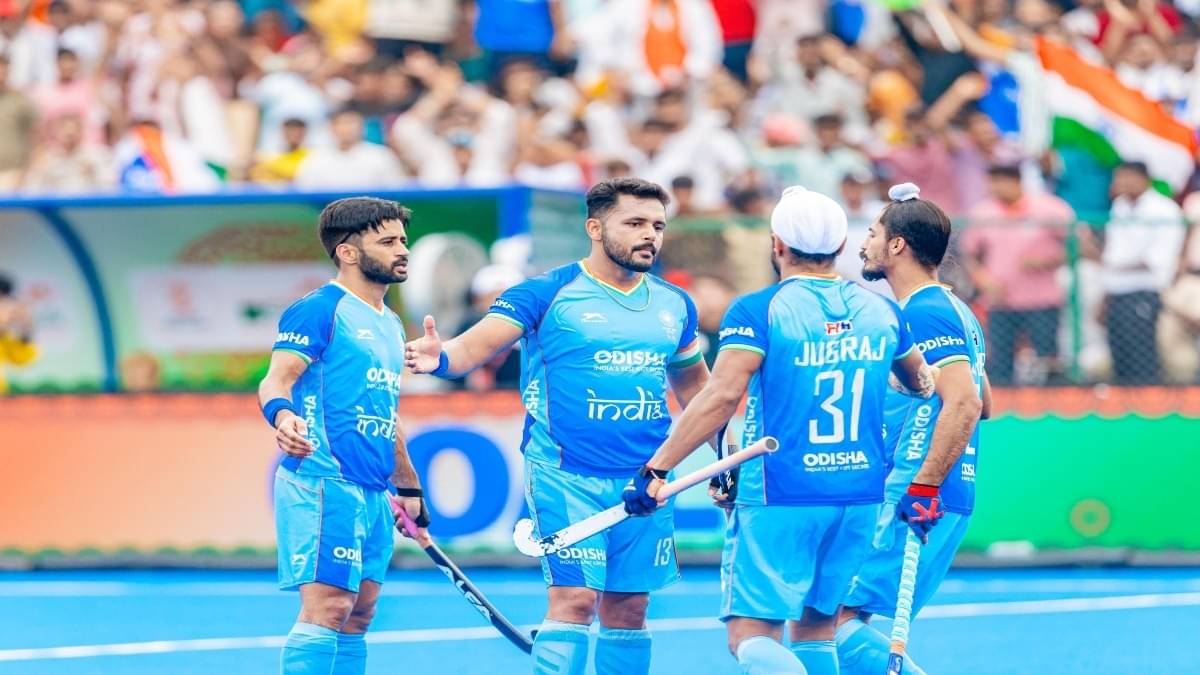 Indian players celebrate a goal against Japan