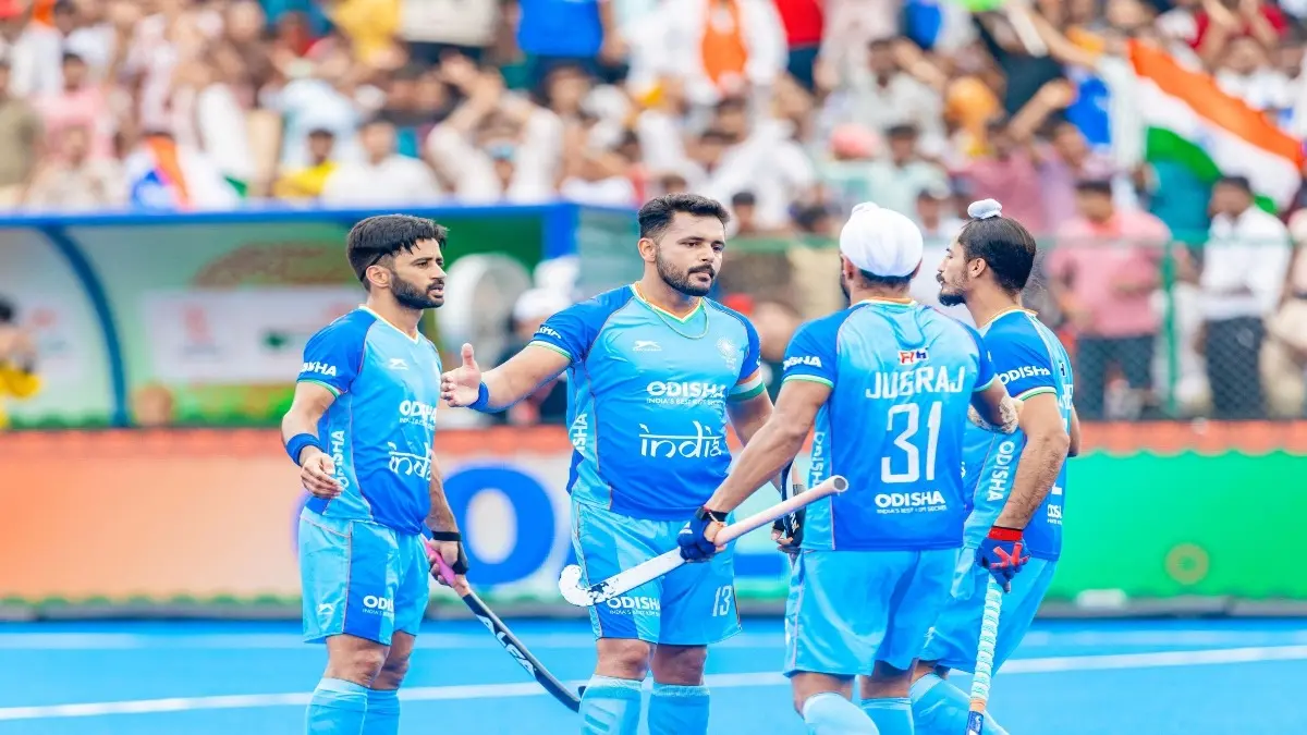 Indian players celebrate a goal against Japan