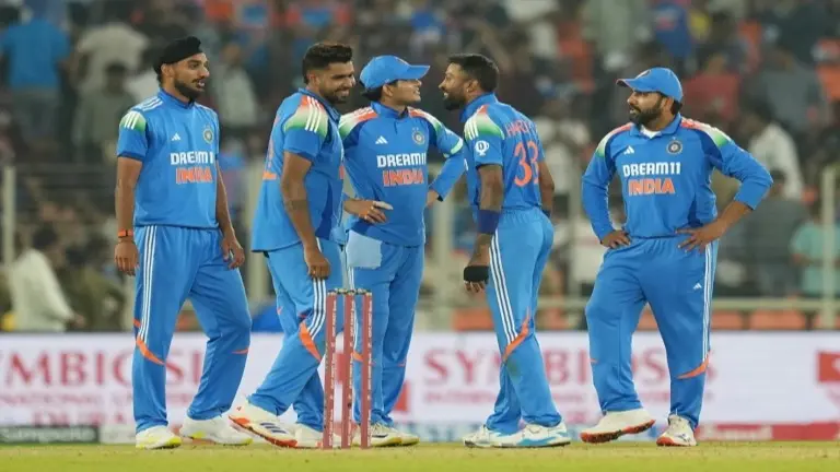 Indian players celebrate a wicket