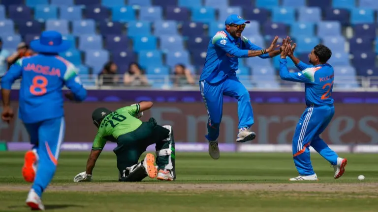 Indian players celebrate a wicket
