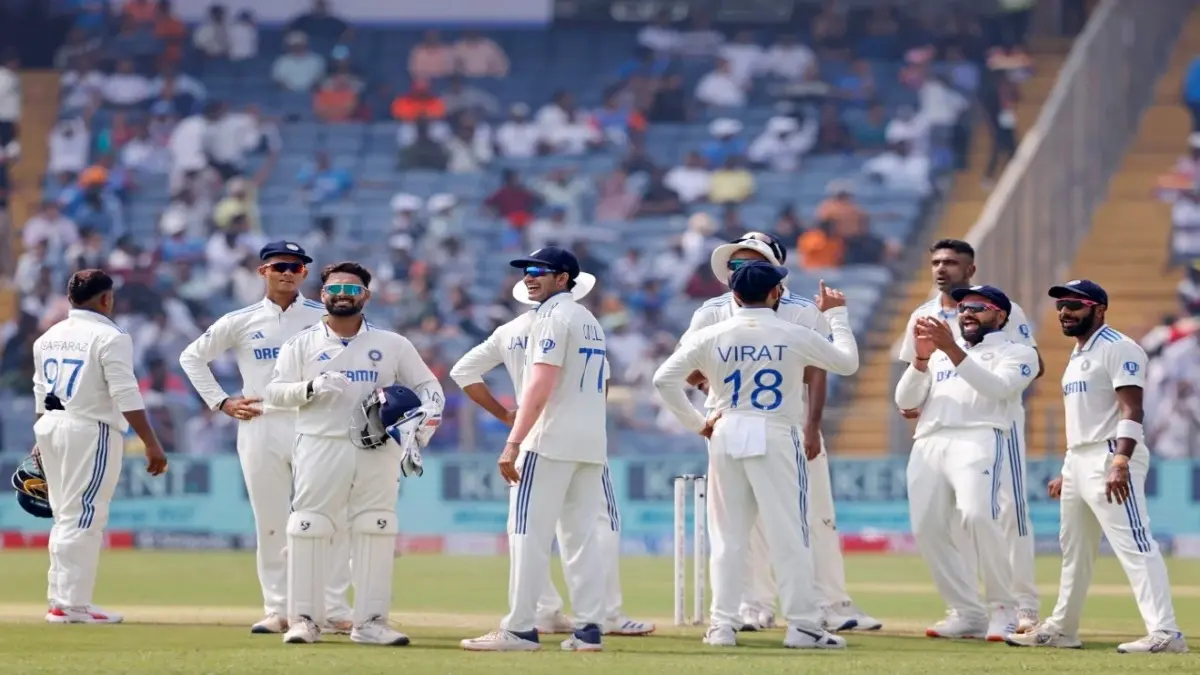 Indian players celebrate a wicket