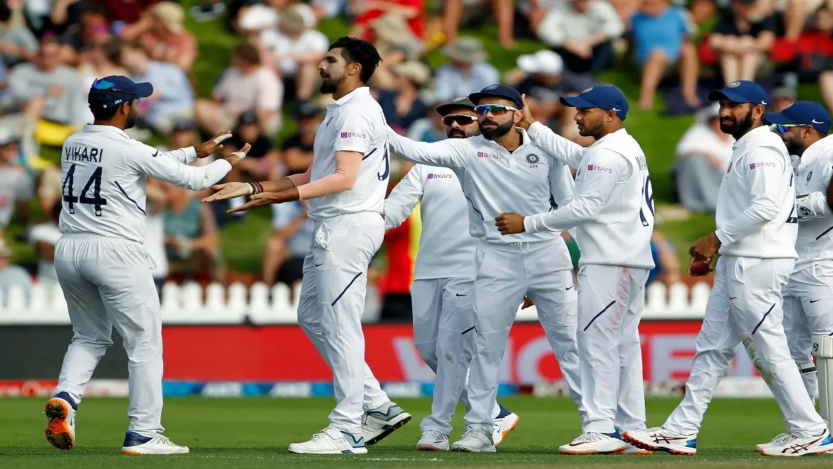 Indian players celebrate a wicket
