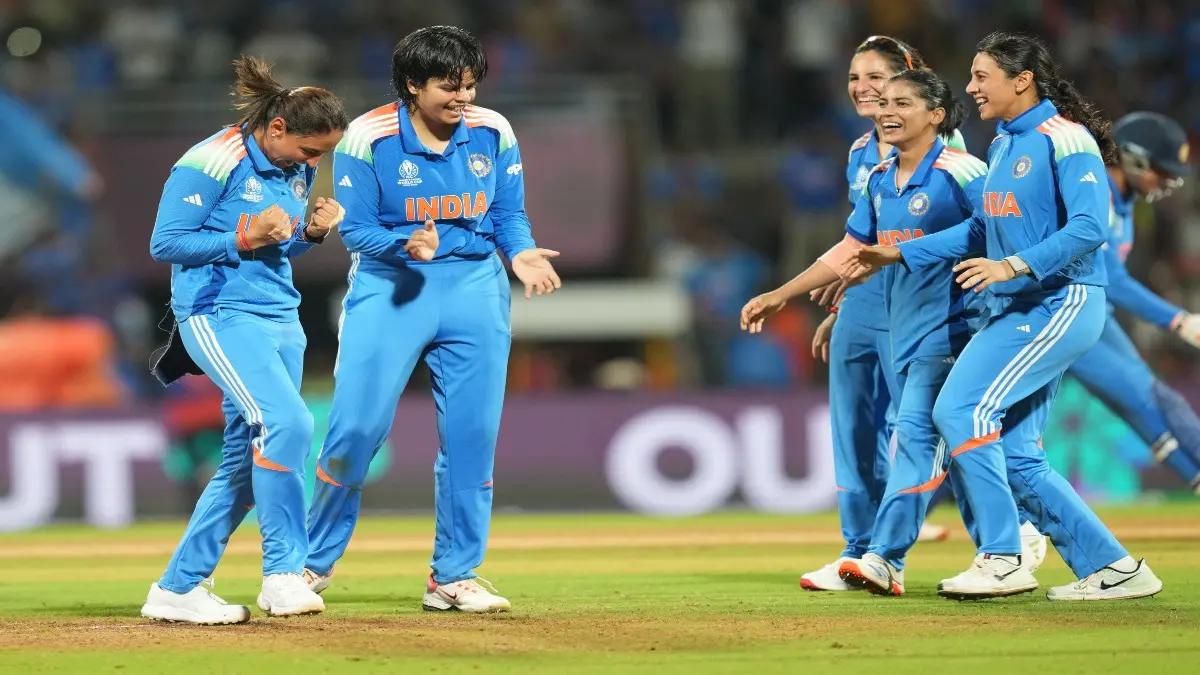 Indian players celebrate a wicket