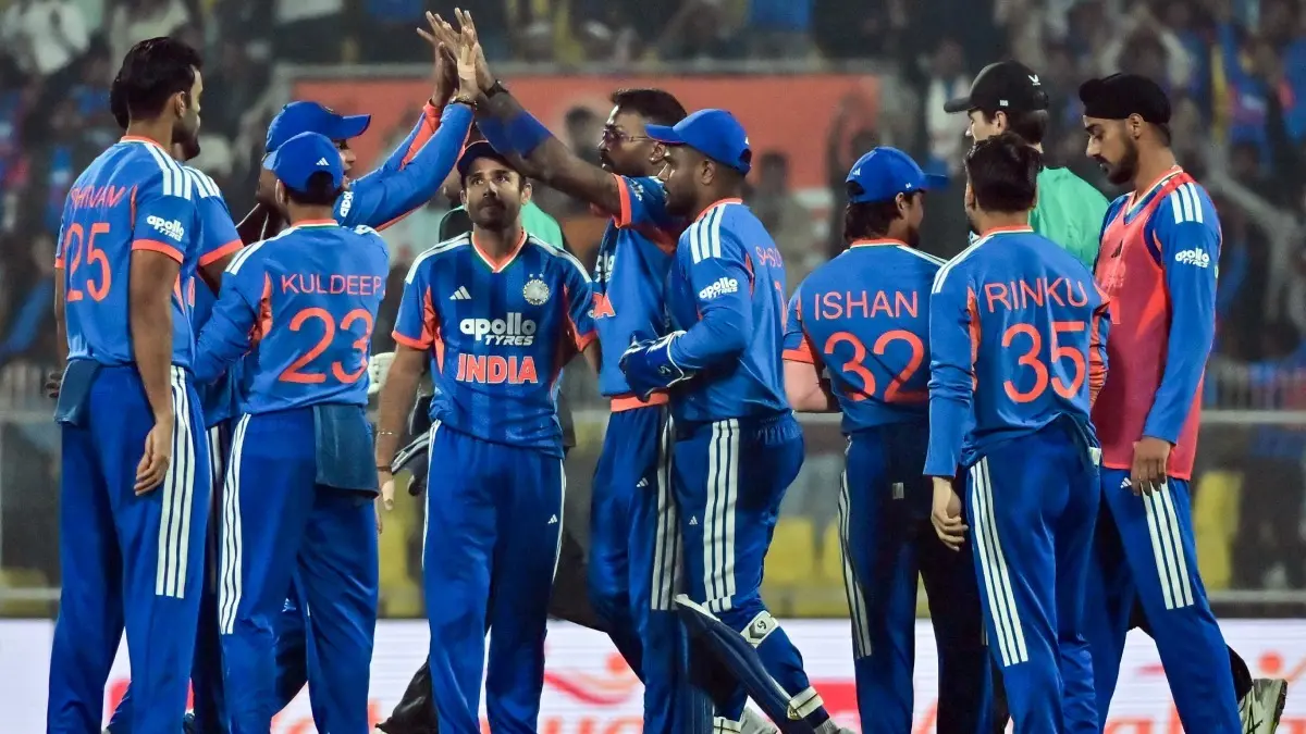 Indian players celebrate a wicket