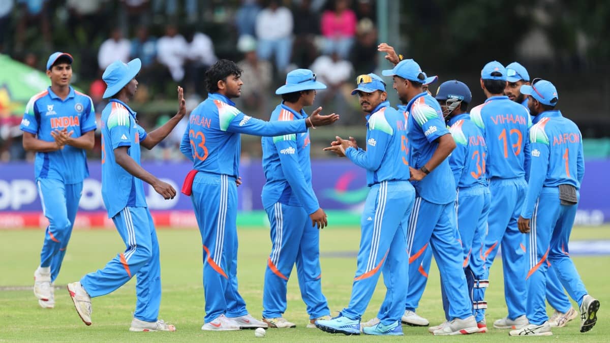 Indian players celebrate a wicket