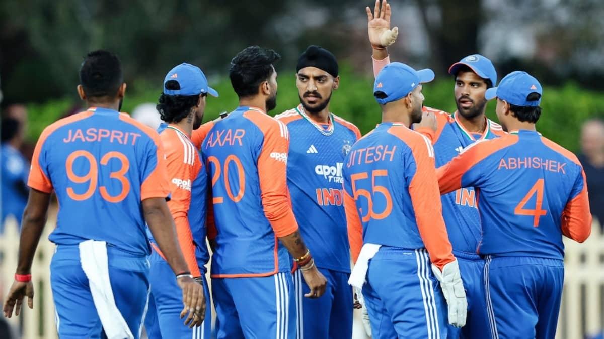 Indian players celebrate after taking a wicket against Australia in 3rd T20Is