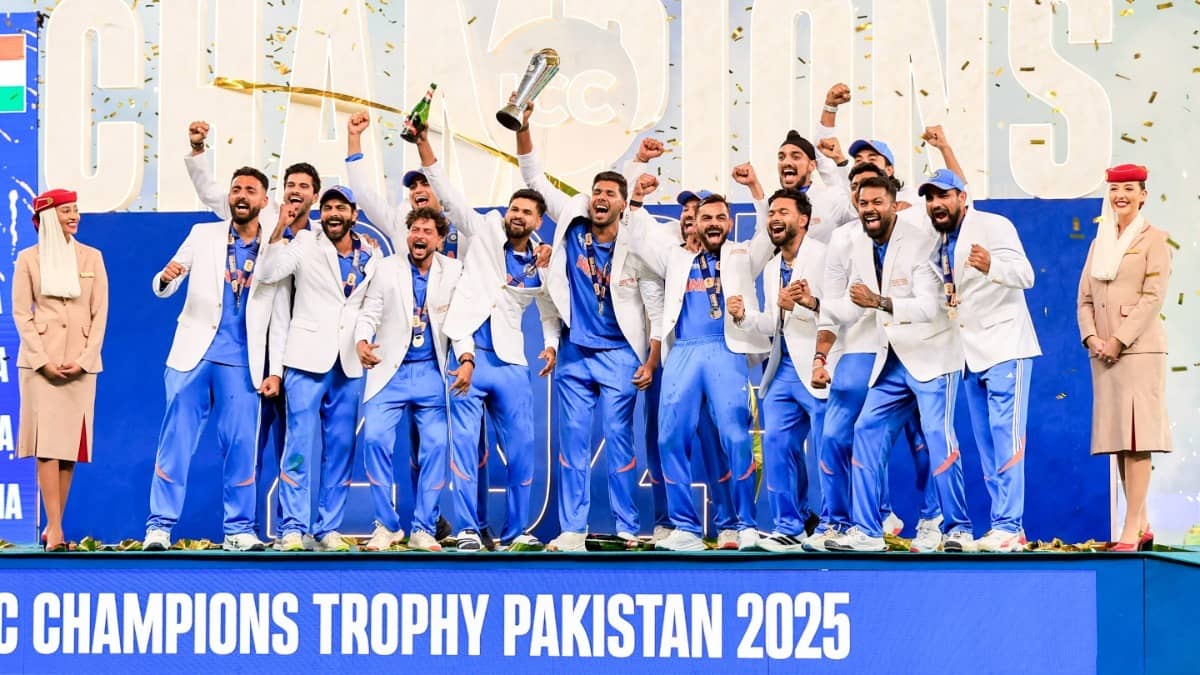 Indian players celebrate with the trophy after winning the ICC Champions Trophy 2025 final match against New Zealand