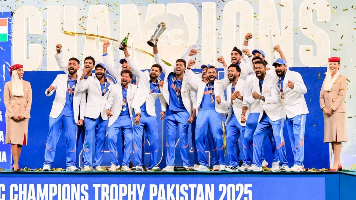 Indian players celebrate with the trophy after winning the ICC Champions Trophy 2025 final match against New Zealand