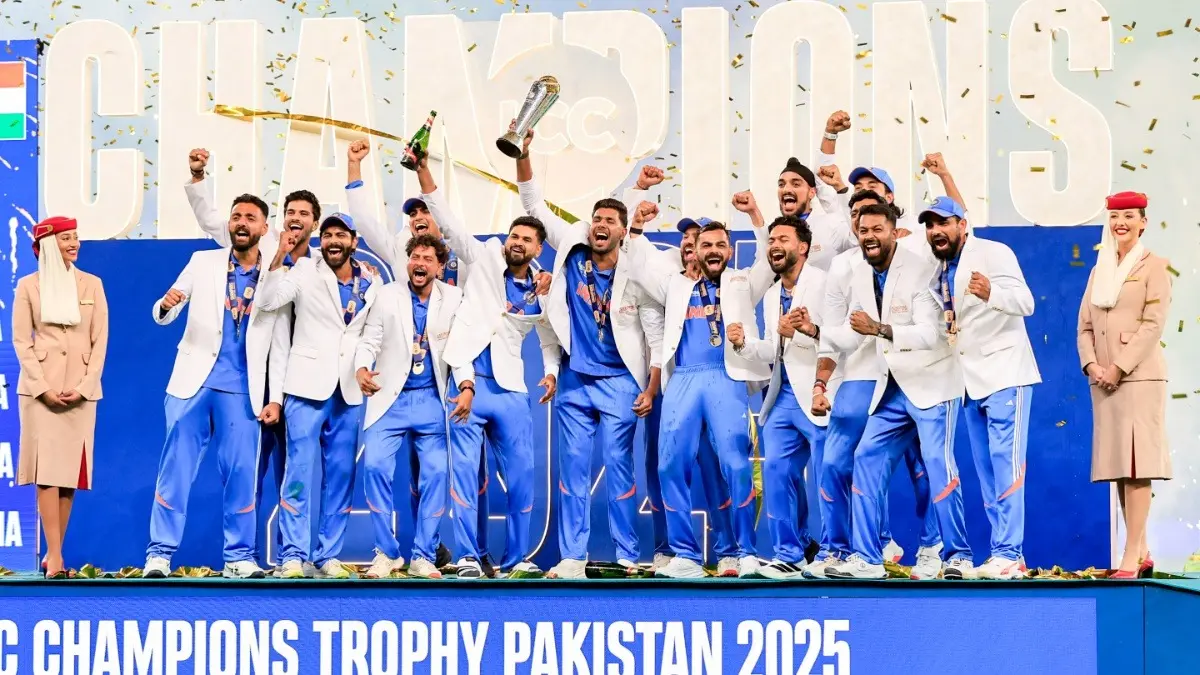 Indian players celebrate with the trophy after winning the ICC Champions Trophy 2025 final match against New Zealand