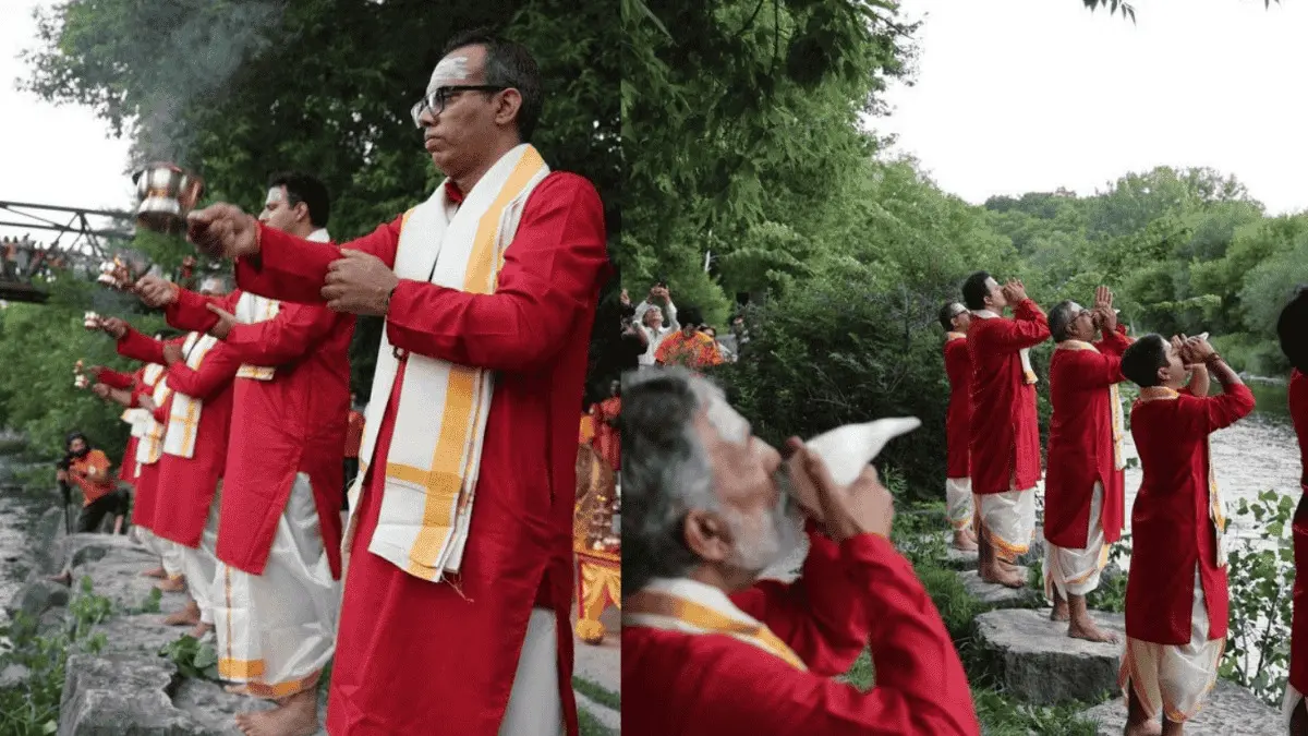 Indians performing Ganga Aarti on the banks of the Credit River in Erindale Park, Mississauga, Canada.